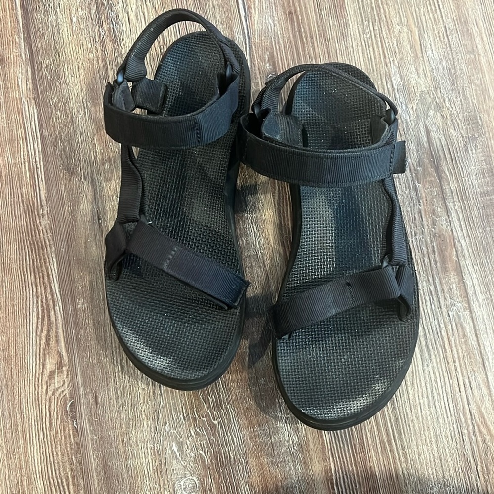 TEVA black sandals.